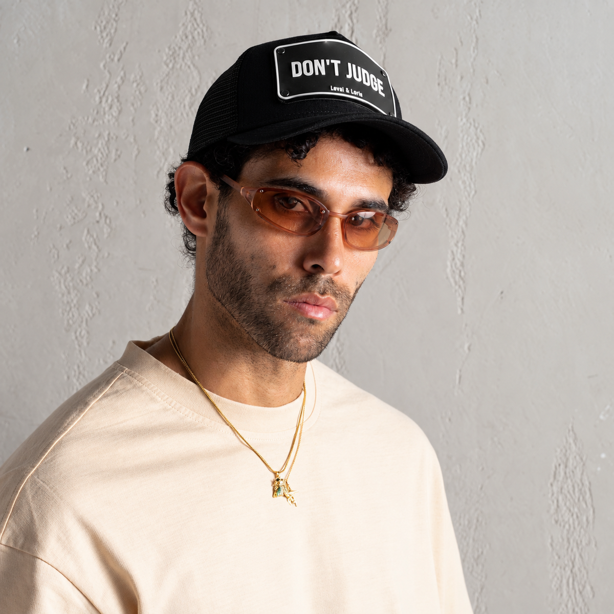 Don’t Judge Black Edition Unisex Trucker cap