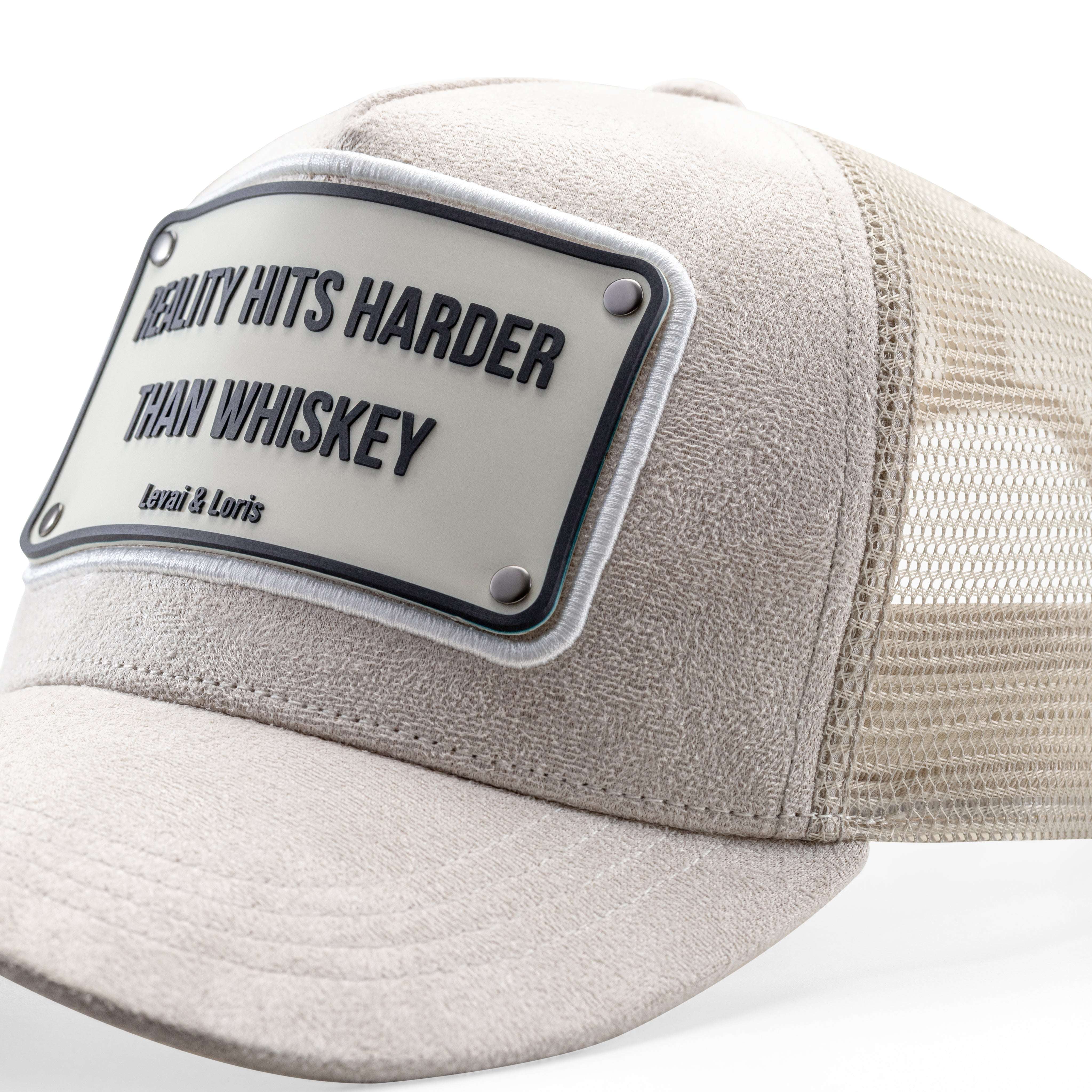 Reality Hits harder than whisky Unisex Trucker cap