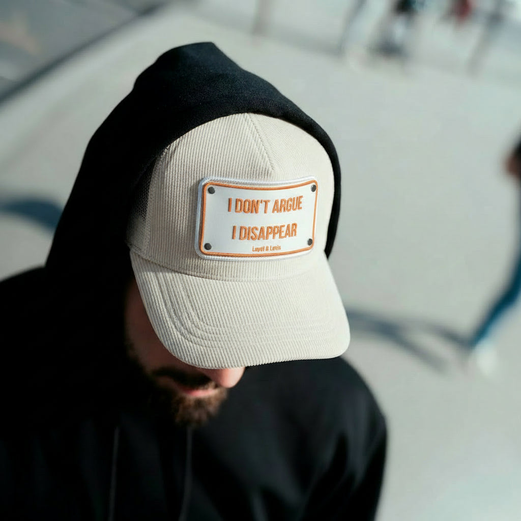 I Dont Argue , I Disappear Trucker cap
