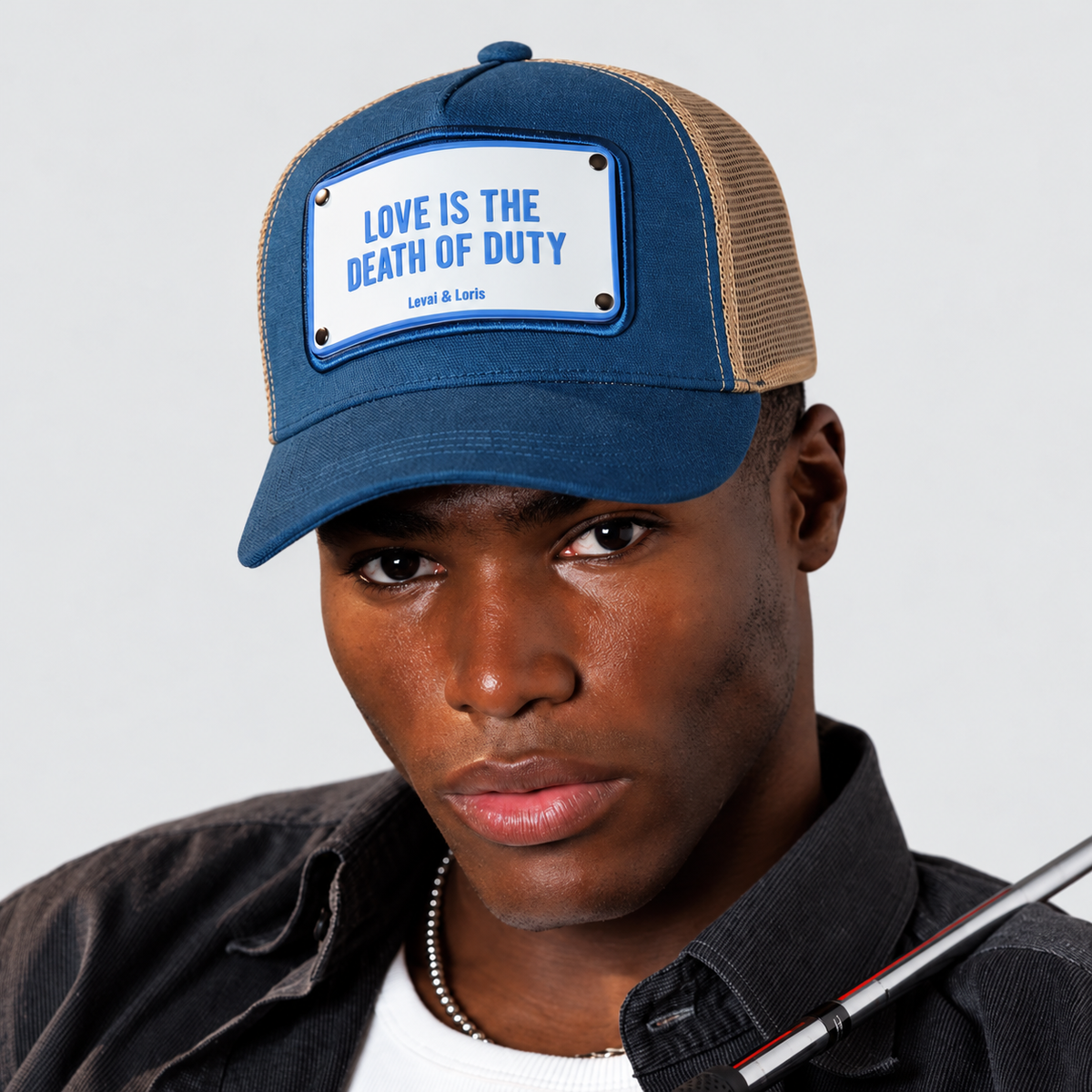 Love is The Death of Duty Trucker Cap